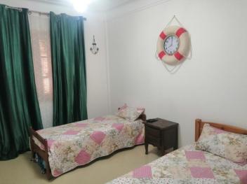 F2 rez de chaussée de villa