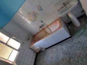 Maison en plein centre