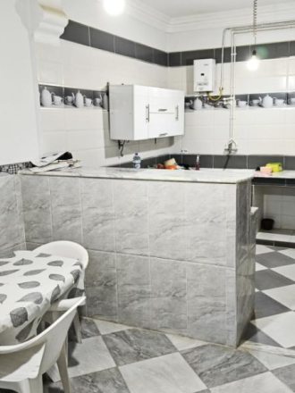 Maison a boussada quartier plateau face a kardada