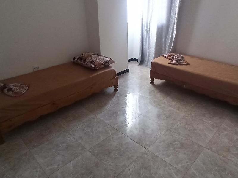 Appartement F4 bien équipé  maison portes